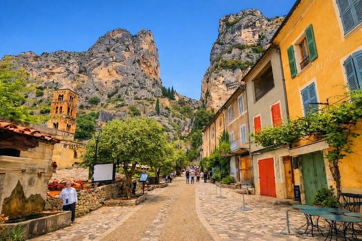 Cliffside village lanes · One of France’s most beautiful villages · Limestone cliffs rising above